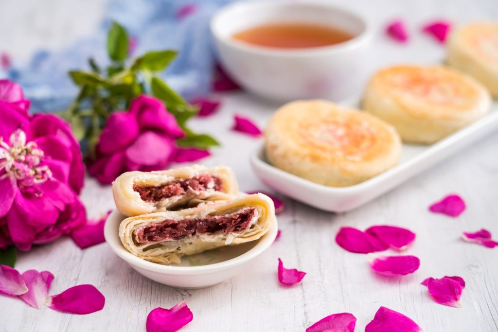 Chinese Yunnan specialty gourmet flower cake on a cutting board